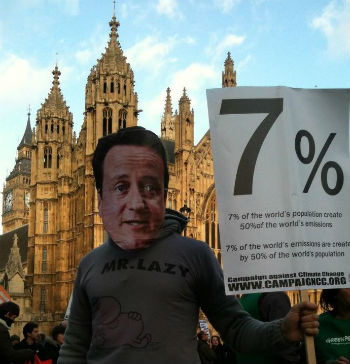 'David Cameron' outside Parliament on the Climate Justice Rally